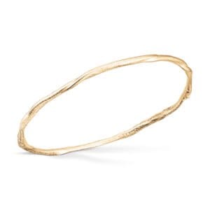 En organisk armring i 14 karat Gult gull, ca 2 - 3 mm tykkelse.